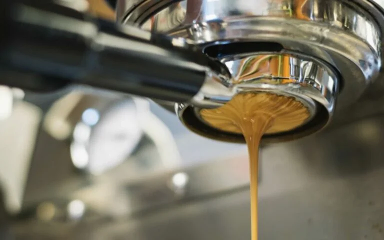 Espresso pulling from coffee machine