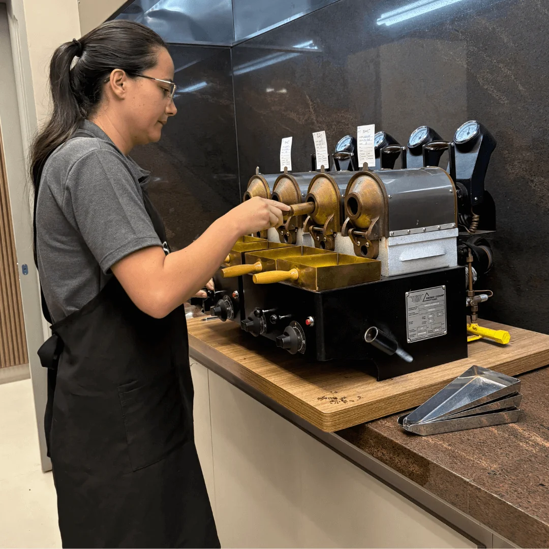 Roaster checking samples at SMC Headquarters