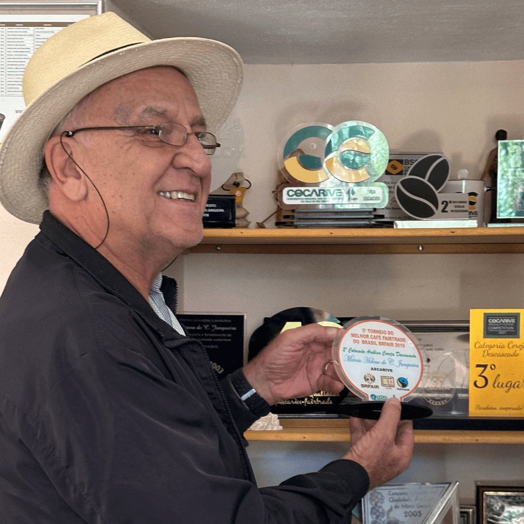 Marico with some of the awards for his coffee farm