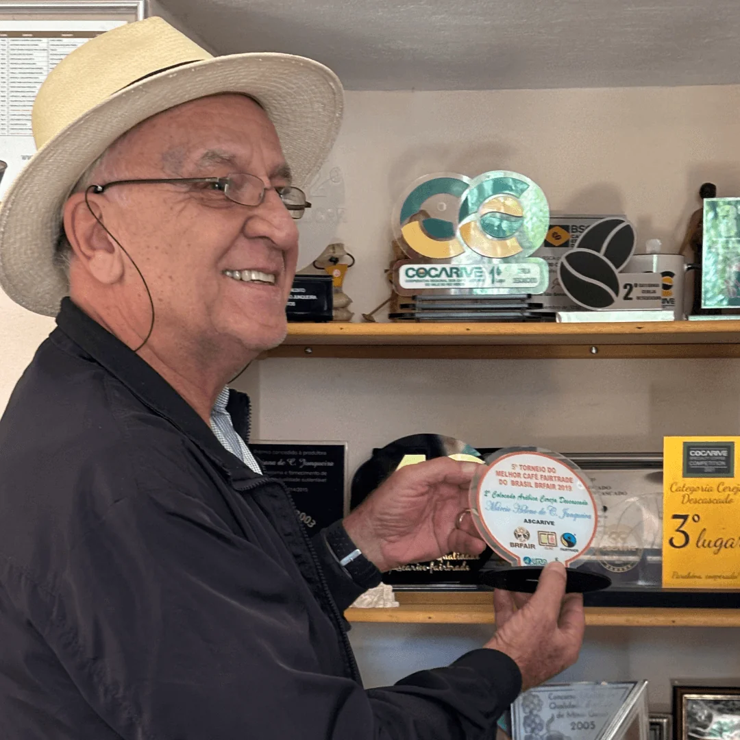 Marico with some of the awards for his coffee farm