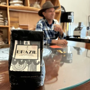 Owner Tiao with the highest ever scoring cup of excellence coffee in Brazil
