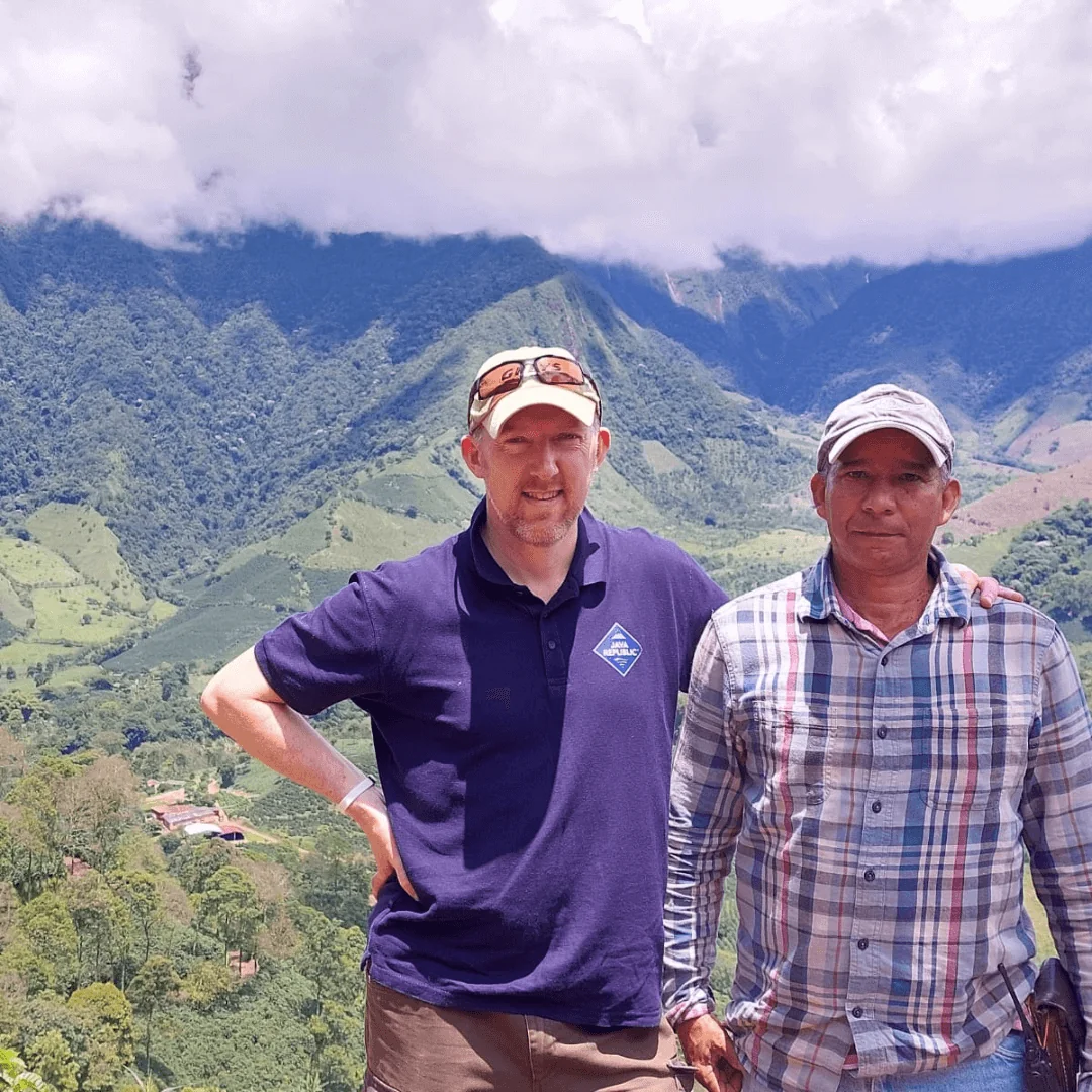 Roy with a coffee farmer on an Origin Trip in Colombia