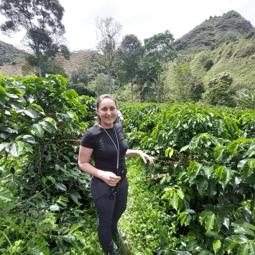 Milena on a coffee farm during an Origin Trip in Colombia